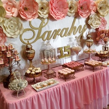mesa de dulces para quince años color rosa