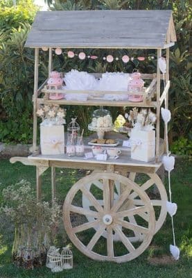 mesa de dulces para bautizo vintage carruaje