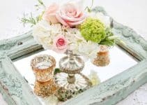 elegancia en hermosos centros de mesa con espejo