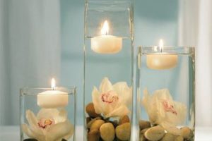 centros de mesa con frascos y velas y flores
