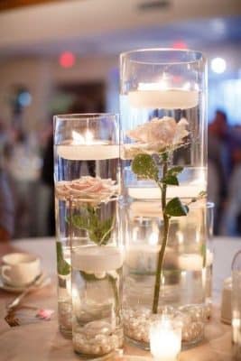 centros de mesa boda con velas y flores