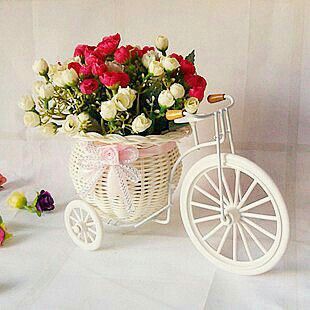 centros de mesa para 15 anos bicicleta con flores