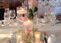 5 creativos centros de mesa con flores en agua para bodas