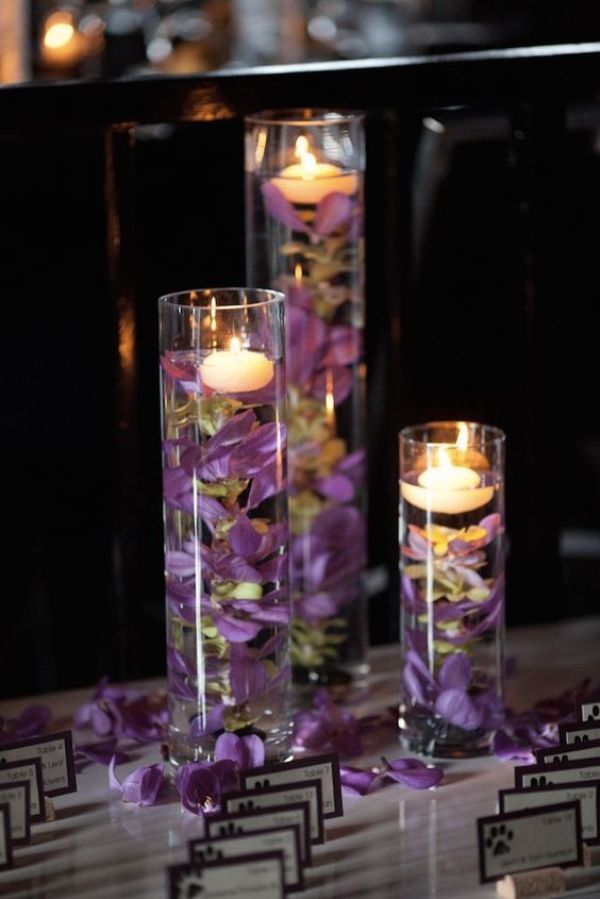 centros de mesa color lila flores flotantes